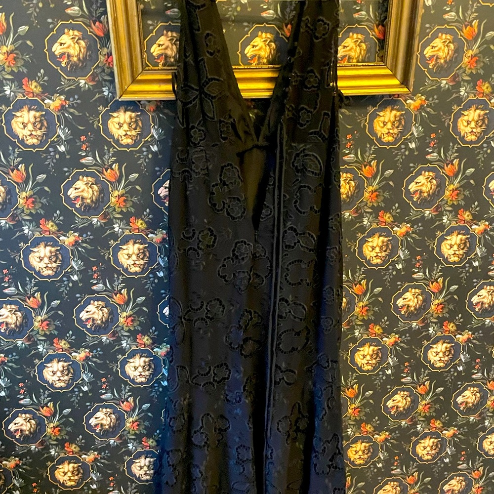 Brand new w/ tag Free People black high-low dress, size 4.